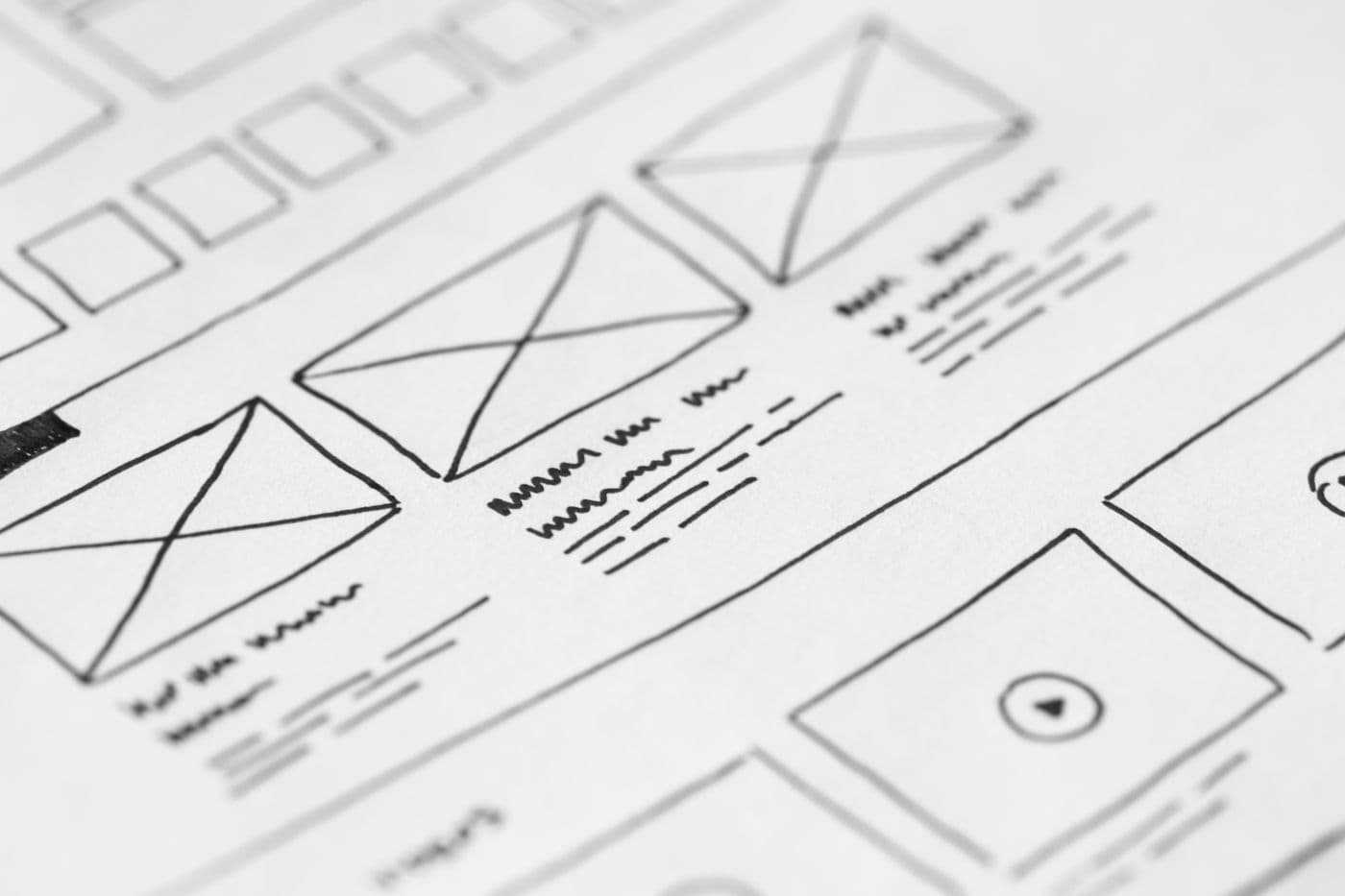 Designer reviewing brand layout and color palette on screen