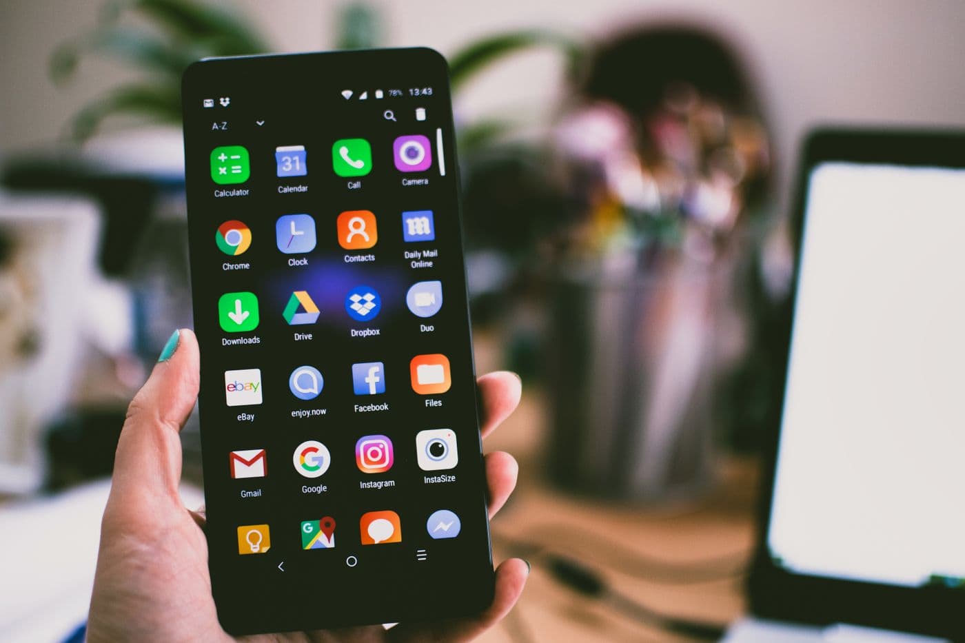 Social media post designs displayed across phone and desktop screens